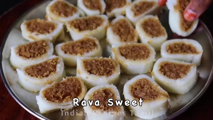 Start cooking the rava and coconut mixture. (Music starts)