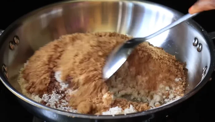 Final steps of cooking and stirring are being done.