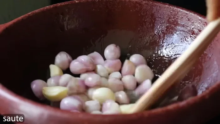 Add tamarind pulp and salt. Mix well.