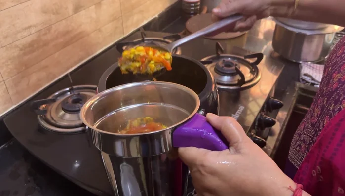 Blend the cooked mixture into a smooth paste using a mixer jar. Add water if needed for a smoother consistency.