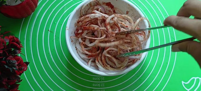 Mix thoroughly to coat the onions with the spices.