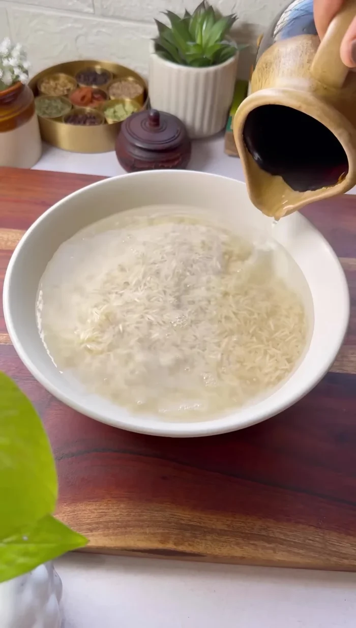 Prepare rice: Wash and soak rice for 30 minutes. Boil water with whole spices, salt, and lemon. Add soaked rice and cook until 90% done (5-7 minutes). Set aside to cool.