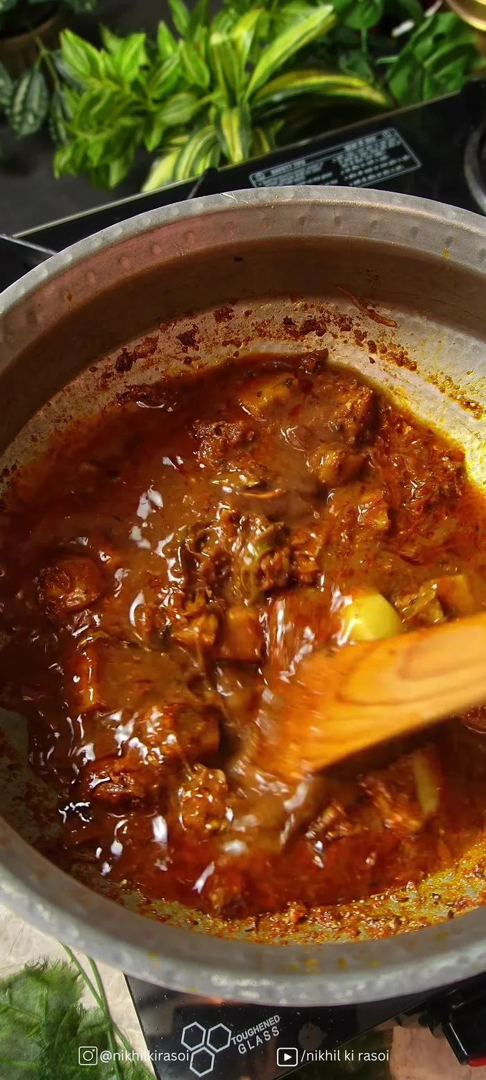 Add chickpea water to make a gravy. Once cooked, add chickpeas, mint, coriander, and garam masala.