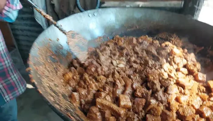 Roast the pork: In a large pot, roast the marinated pork for approximately 10 minutes without adding oil. The fat from the meat will render during cooking.