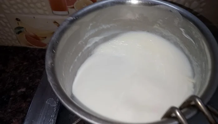 Gently warm the milk on very low flame. It should be lukewarm; you shouldn't get burned if you insert your finger.