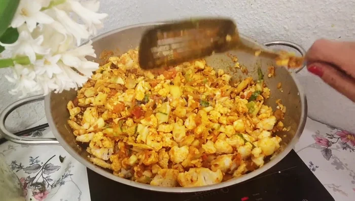 Cover and cook on low flame for 5-7 minutes, or until half-cooked. Stir occasionally to prevent sticking.
