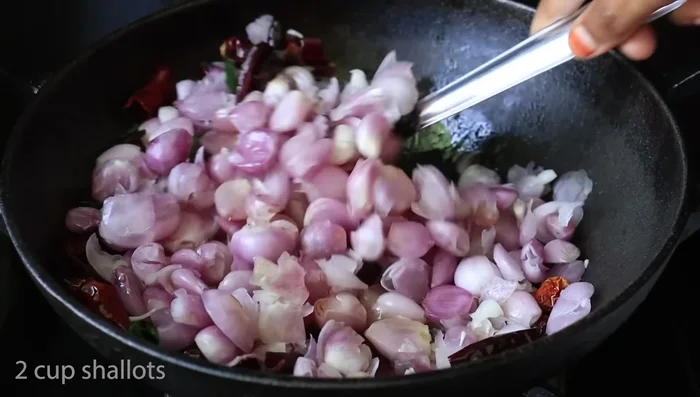 Add chopped onions (small or large, as preferred) and salt. Fry until soft and cooked.
