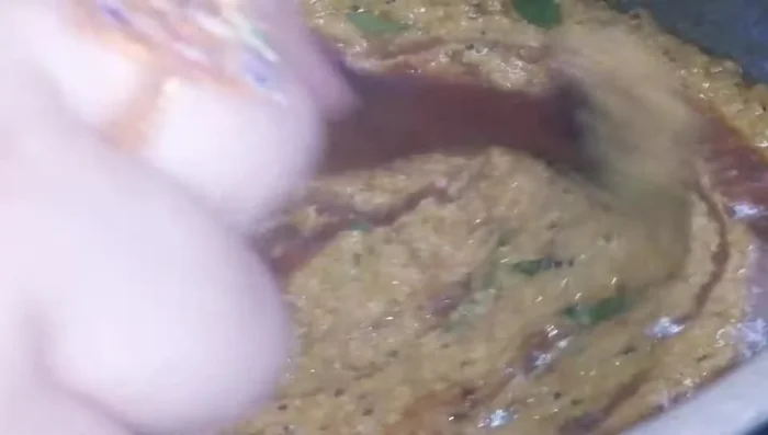 Add tamarind pulp and salt. Fry until oil separates again. (367.36)