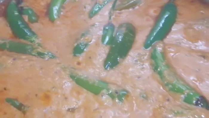 Cover and cook for another 5-6 minutes, or until the green chilies are cooked through. (492.72)