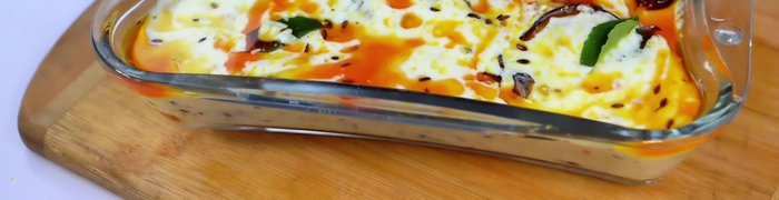 Serve the Dahi Wale Baingan with white rice.