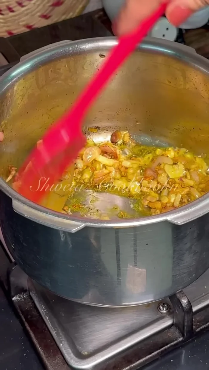 Add finely chopped onion and fry until slightly brown.