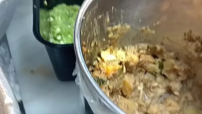 Prepare the vegetable side dish.