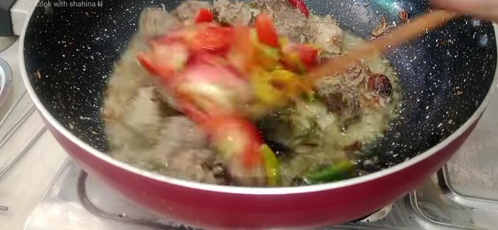 Add tomatoes and green chilies. Mix well. Add curd and fry until the water is released.