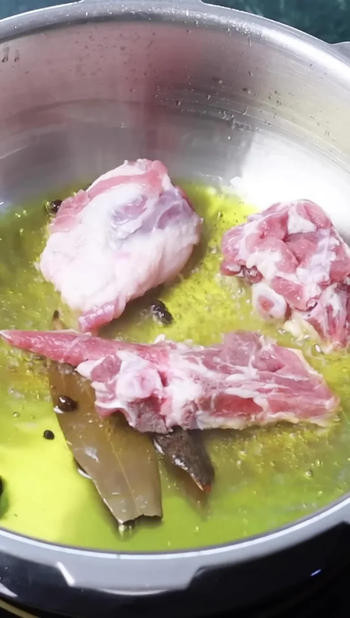 Add goat meat and fry for 2-3 minutes, stirring constantly, until browned evenly. Add salt.