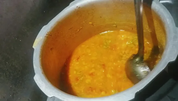 Stir in lots of green coriander.
