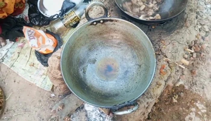 Heat oil in a pan and add onions. Fry until slightly browned.