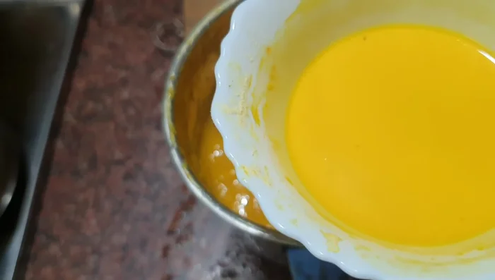 Dissolve custard powder in water.