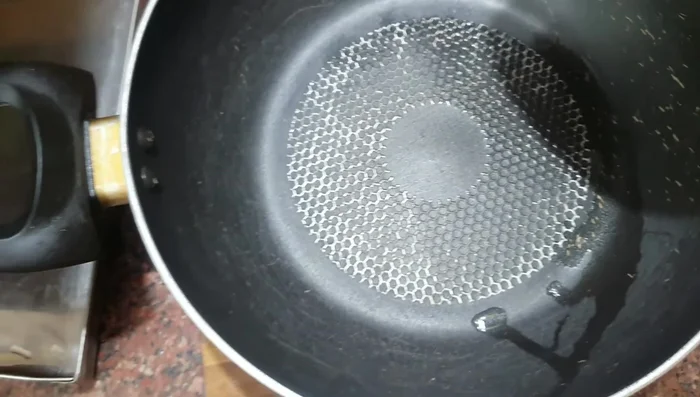 Transfer the mixture to a cooking pot. Cook over medium heat, stirring frequently to prevent sticking.