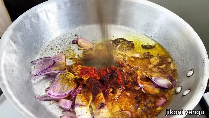 Add curry powder, paprika, black pepper, and salt. Mix well.