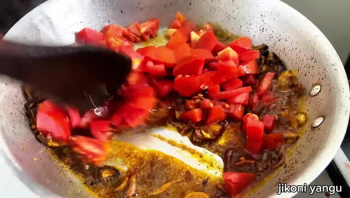 Add chopped tomatoes (or blended tomatoes). Cover and cook until softened.