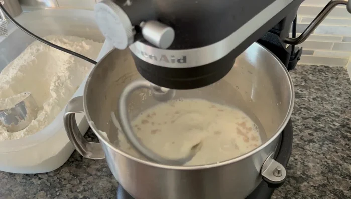 Knead the dough until smooth and elastic. Let it rise in a bowl for about two hours.