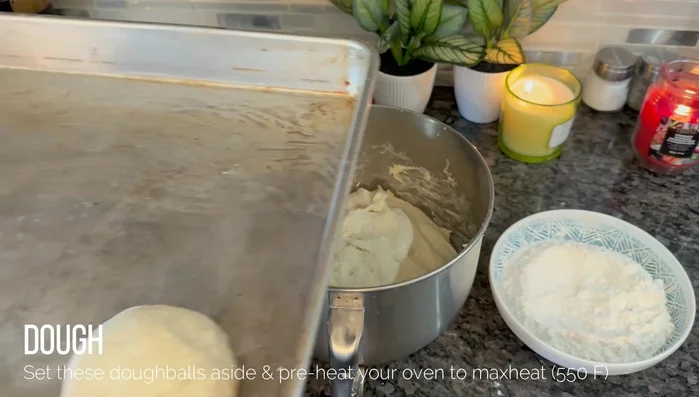 Preheat oven to 550°C (max). Place the naan on a baking tray, leaving some space between them. Sprinkle with sesame seeds.