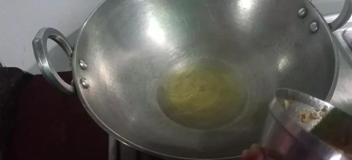 Fry the onions until softened. Add the ground spice mixture to the raw spices.