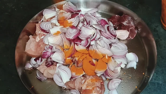 Heat mustard oil in a pan. Add bay leaves.