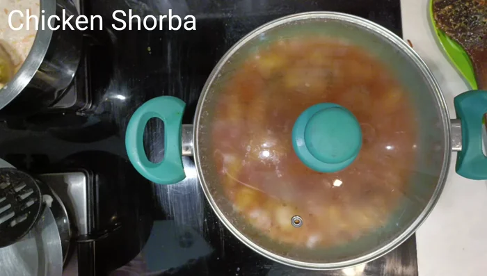 Add green chilies, water. Cook until chicken and potatoes are done. Increase heat to a boil, then reduce to medium until desired consistency is reached.