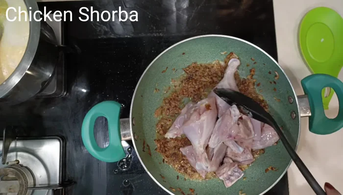 Add cleaned and drained chicken; saute until color changes.