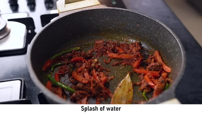 If needed, add a little water to prevent the spices from burning.
