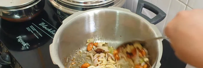 Stir in ginger-garlic-green chili paste.