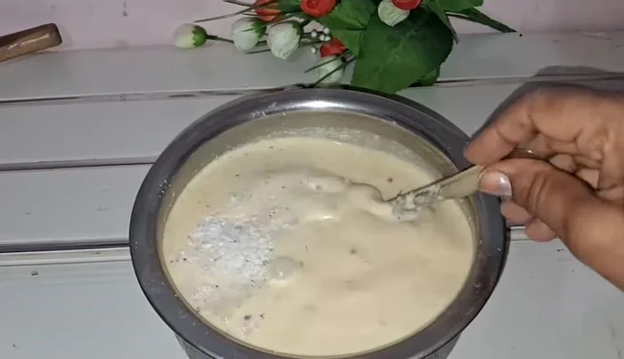 Stir in 2 spoons of finely grated coconut.