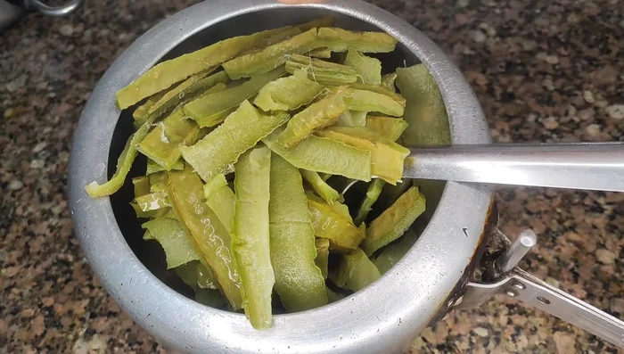 Once the peels are soft, remove them from the cooker and let them cool.