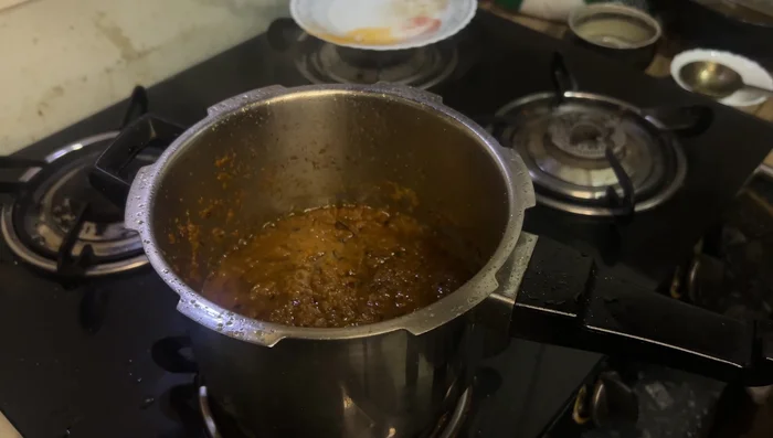Cover and cook for 5 minutes until oil separates.