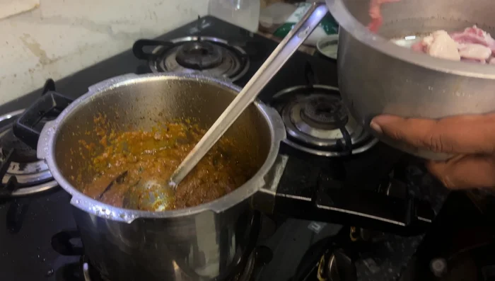 Add mutton and fry well with spices for 10 minutes.