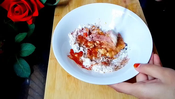 Add water to the masala and mix well to form a paste.