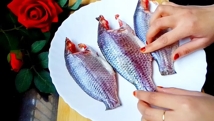 Wash and clean the fish thoroughly. Make slightly deep cuts into the fish to allow the spices to penetrate.