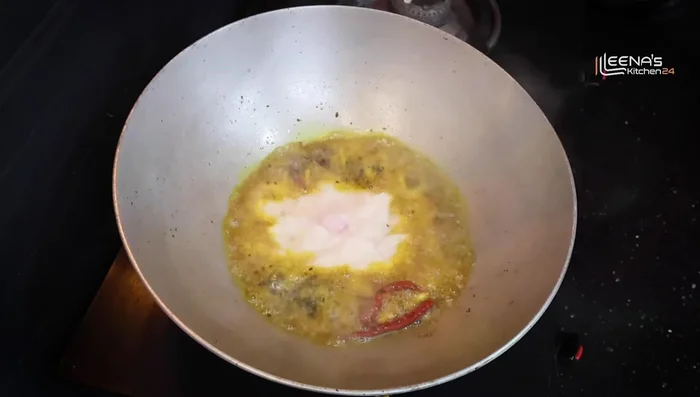 Add the onion-tomato paste and fry on high flame for 5-6 minutes until the water dries up.