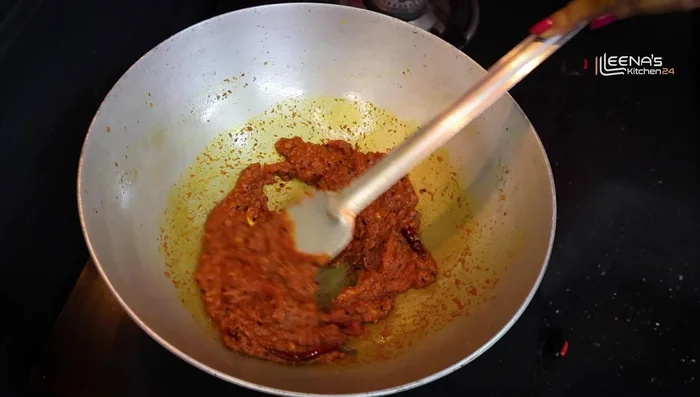 Fry the masala for 2-3 minutes. Add the tomato paste and salt. Fry for 4-5 minutes until the tomato water dries up.