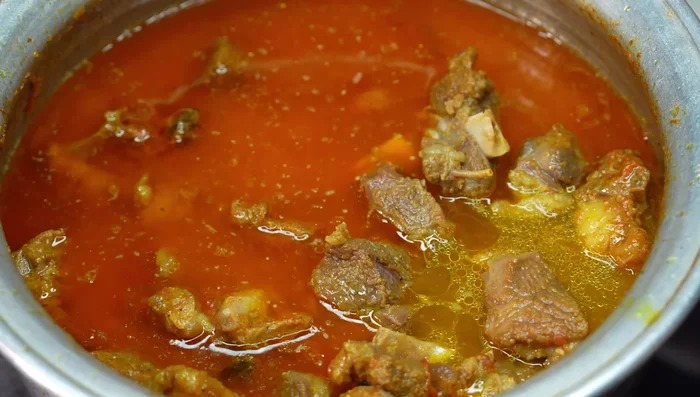 Add water (2 glasses, or 1 for a pressure cooker). Mix well and cover. Cook on low to medium flame for 30-35 minutes.