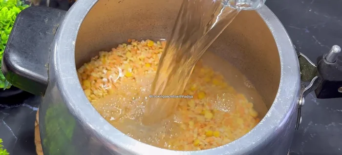 Pressure cook the lentils with 4 glasses of water and 1 tsp of salt for 20 minutes on medium flame. If using a pan, cook for 30-35 minutes.