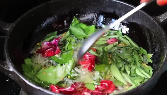 Heat the mixture gently over low heat. (Specific details and timing missing from transcript)