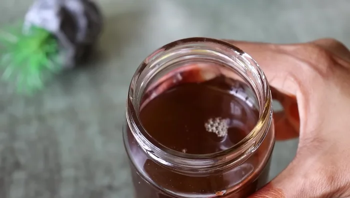 Transfer the oil to a storage bottle. (Unspecified)
