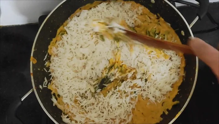 Add the soaked rice and water (adjust water as needed). Add salt.