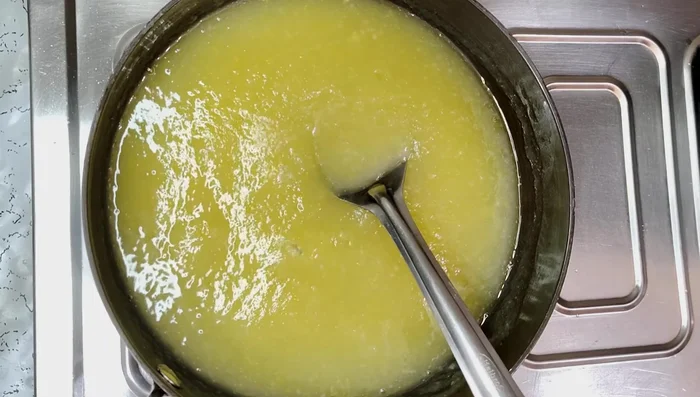 Cook the mixture on low heat for 10 minutes, stirring continuously, until it thickens.