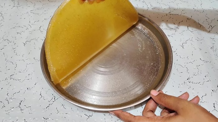 Wash and cut the top of the four raw mangoes. Peel the mangoes using a knife or potato peeler.