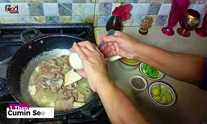 Add 1 tablespoon of whole cumin seeds and 1 tablespoon of black pepper to the pan.