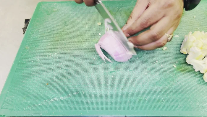 Finely chop half an onion.
