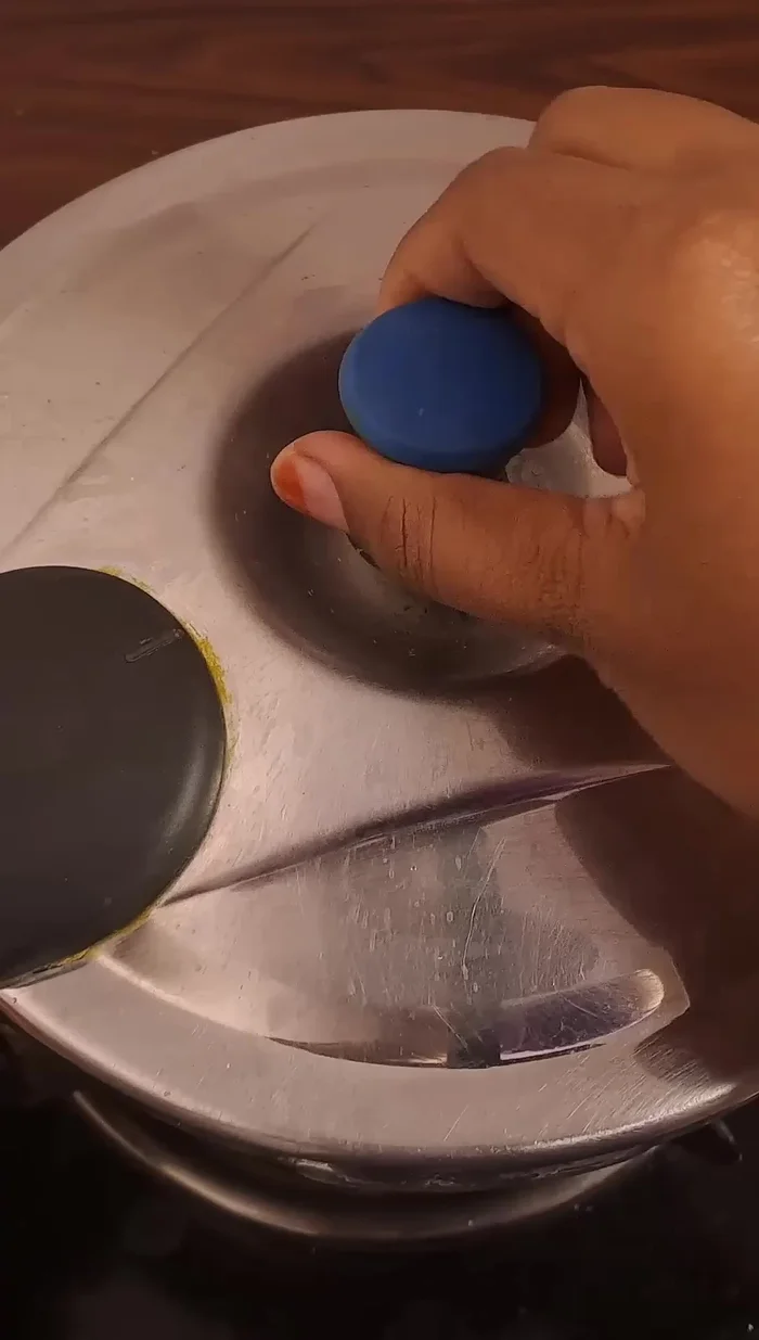Once the pressure is released, open the cooker, mix patiently, and serve hot.